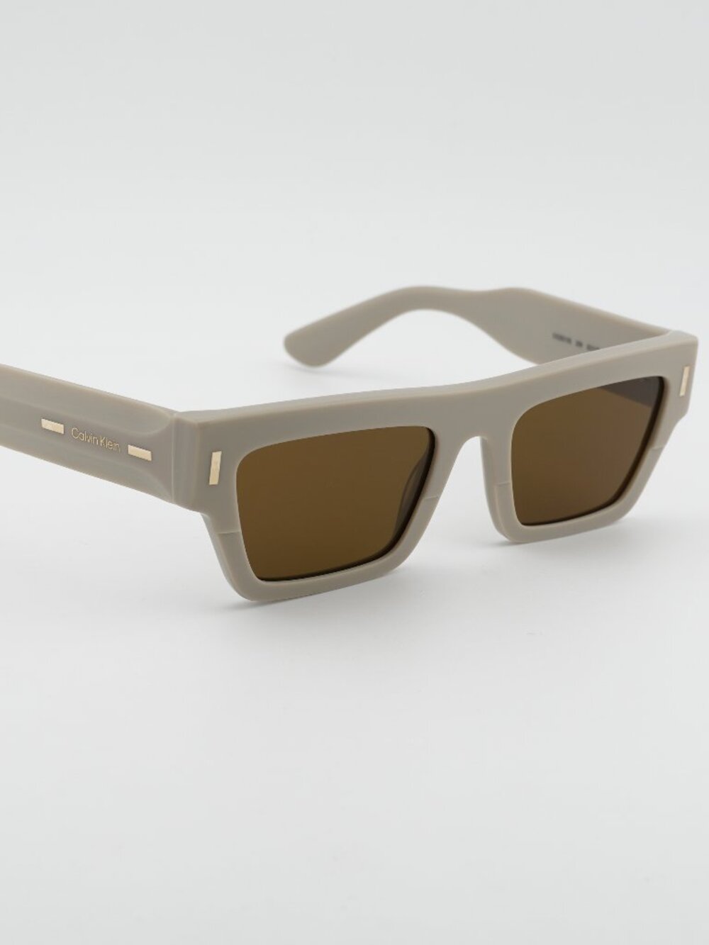 Calvin Klein CK25510S 209 Unisex Sunglasses Beige Rectangle Frame, Brown Lenses